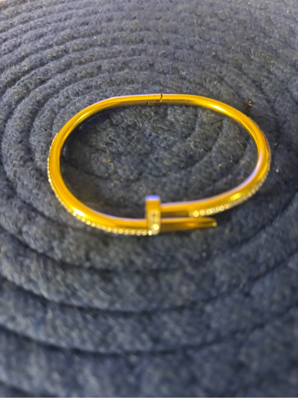 Gold Tone Hinged Bracelet with Crystal Accent